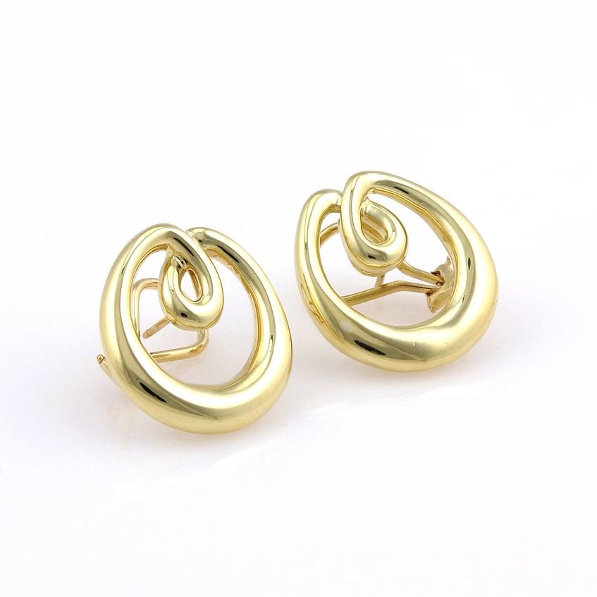 TIFFANY & CO. GOLD LOOP EARRINGS 18K YELLOW POST CLIP W/BOX: TIFFANY & CO. GOLD LOOP EARRINGS 18K YELLOW POST CLIP W/BOX TIFFANY & CO. GOLD LOOP EARRINGS 18K YELLOW POST CLIP W/BOX These Tiffany & Co. Gold Loop Earrings are crafted from 18k yellow gold and feat