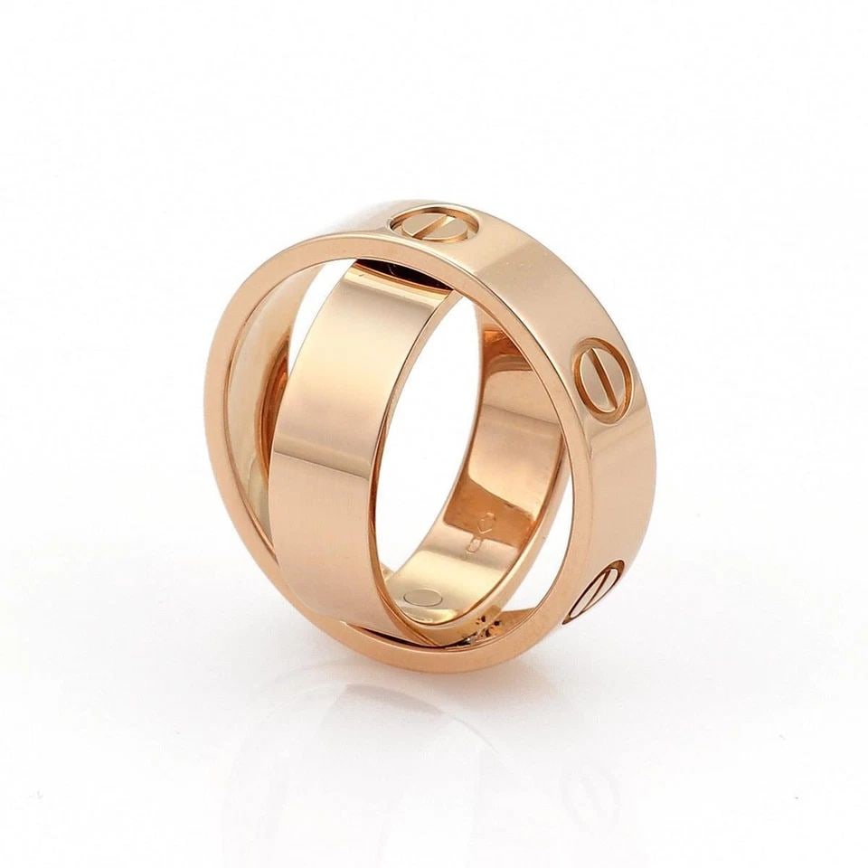 CARTIER LOVE RING SECRET 18K PINK GOLD 5.5MMSIZE 54-US 7 W/CERT: CARTIER LOVE RING SECRET 18K PINK GOLD 5.5MMSIZE 54-US 7 W/CERT CARTIER LOVE RING SECRET 18K PINK GOLD 5.5MMSIZE 54-US 7 W/CERT The Cartier Love Ring in Secret 18k Pink Gold with a 5.5mm size 54 (US 7