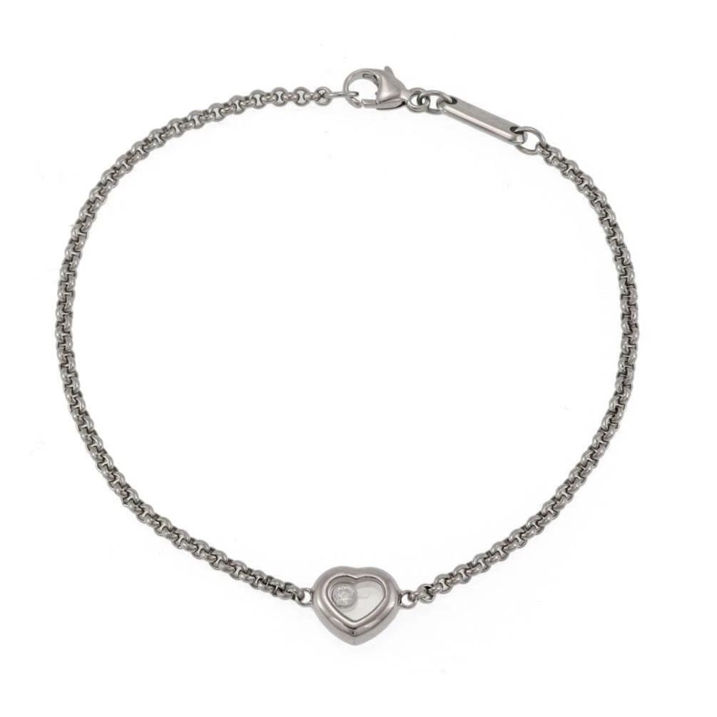 CHOPARD BRACELET HAPPY DIAMOND 18K WHITE GOLD HEART CHARM W/CERTIFICATE: CHOPARD BRACELET HAPPY DIAMOND 18K WHITE GOLD HEART CHARM W/CERTIFICATE CHOPARD BRACELET HAPPY DIAMOND 18K WHITE GOLD HEART CHARM W/CERTIFICATE The Chopard Bracelet Happy Diamond is a luxurious and el