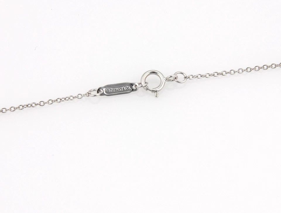 TIFFANY & CO. DIAMOND GOLD NECKLACE 18K WHITE CUSHION SHAPE PENDANT PAVE: TIFFANY & CO. DIAMOND GOLD NECKLACE 18K WHITE CUSHION SHAPE PENDANT PAVE TIFFANY & CO. DIAMOND GOLD NECKLACE 18K WHITE CUSHION SHAPE PENDANT PAVE The Tiffany & Co. diamond gold necklace features a stu