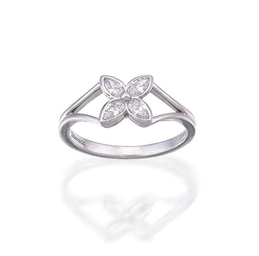 TIFFANY & CO. VICTORIA RING DIAMOND PLATINUM FLORAL STYLE: TIFFANY & CO. VICTORIA RING DIAMOND PLATINUM FLORAL STYLE TIFFANY & CO. VICTORIA RING DIAMOND PLATINUM FLORAL STYLE The Tiffany & Co. Victoria Ring is a luxurious piece of fine jewelry featuring a mar