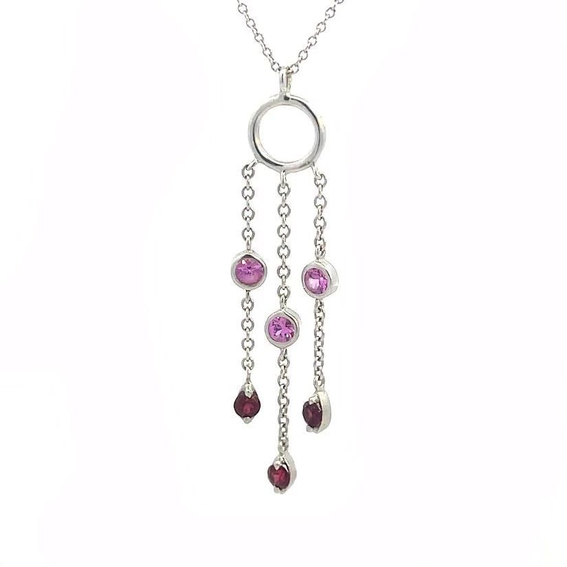 TIFFANY & CO. FRINGE PENDANT PINK SAPPHIRE GARNET 18K GOLD CHAIN: TIFFANY & CO. FRINGE PENDANT PINK SAPPHIRE GARNET 18K GOLD CHAIN TIFFANY & CO. FRINGE PENDANT PINK SAPPHIRE GARNET 18K GOLD CHAIN Elegant and authentic by Tiffany & Co. from their Fringe Collection. T