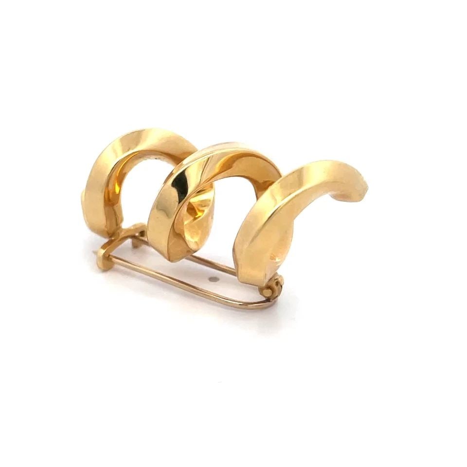 TIFFANY & CO. GOLD BROOCH 18K YELLOW SPIRAL TWIST STYLE: TIFFANY & CO. GOLD BROOCH 18K YELLOW SPIRAL TWIST STYLE TIFFANY & CO. GOLD BROOCH 18K YELLOW SPIRAL TWIST STYLE This is a lovely Tiffany & Co. gold brooch. It is a piece of fine jewelry featuring a sp