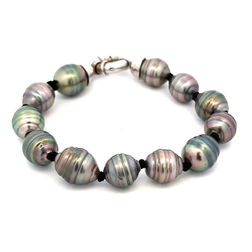 18K WHITE GOLD PEARL BRACELET SOUTH SEA DARK GRAY STRAND: 18K WHITE GOLD PEARL BRACELET SOUTH SEA DARK GRAY STRAND 18K WHITE GOLD PEARL BRACELET SOUTH SEA DARK GRAY STRAND This is a lovely bracelet, the large spring ring clasp is crafted from 18k white gold 