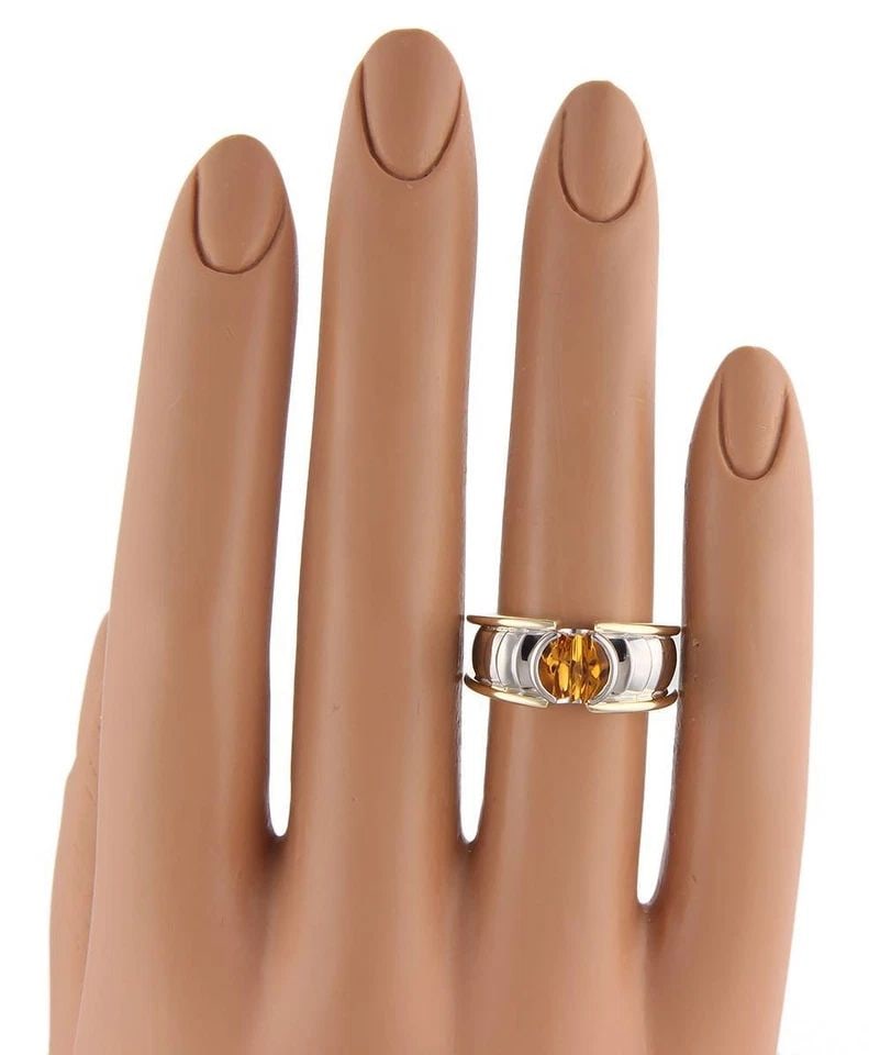 GEORG JENSEN CITRINE GOLD RING 18K 2 TONE SOLITAIRE BAND: GEORG JENSEN CITRINE GOLD RING 18K 2 TONE SOLITAIRE BAND GEORG JENSEN CITRINE GOLD RING 18K 2 TONE SOLITAIRE BAND The Georg Jensen Citrine Gold Ring is a stunning piece of fine jewelry featuring a bea