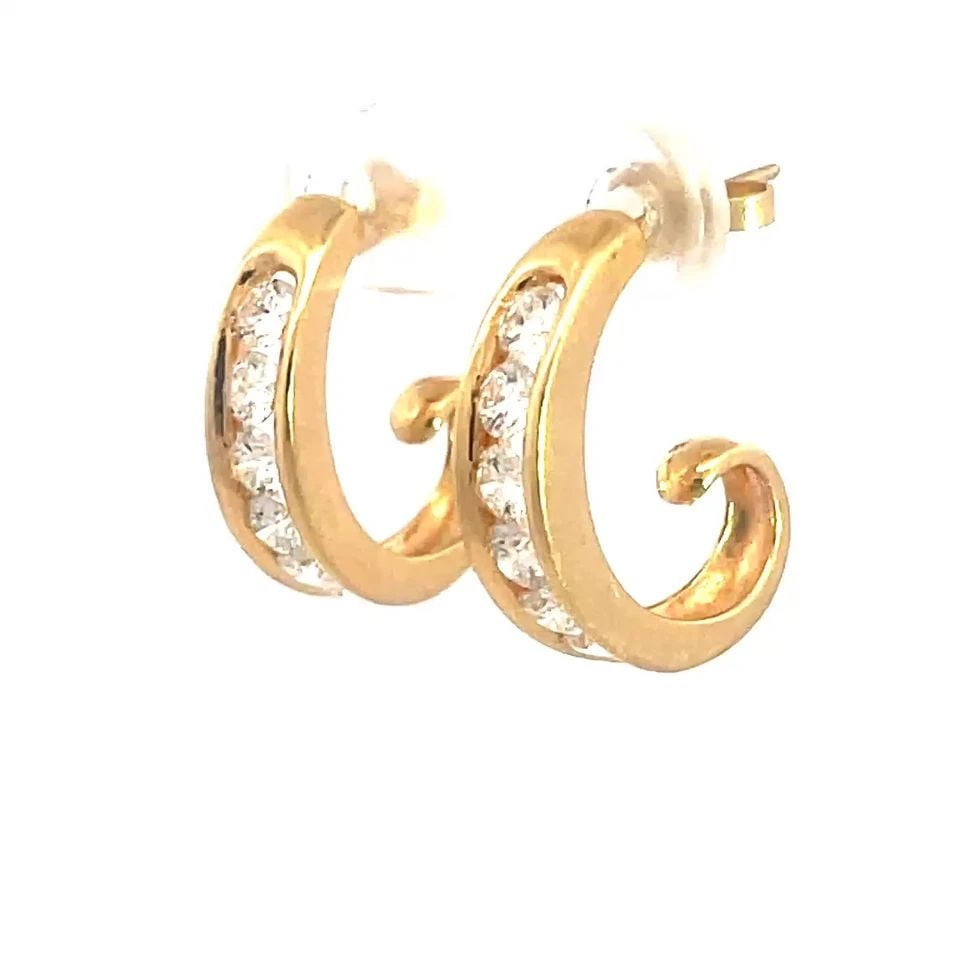 DIAMOND GOLD EARRINGS 14K YELLOW CHANNEL SET HALF HOOP STYLE: DIAMOND GOLD EARRINGS 14K YELLOW CHANNEL SET HALF HOOP STYLE These Diamond Gold Earrings are a stunning addition to any jewelry collection. Featuring natural channel set white diamonds in 14k yellow g
