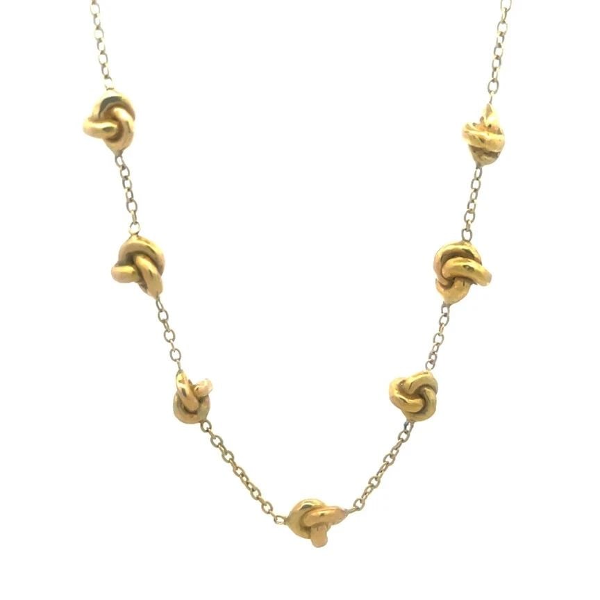 70460 IPPOLITA GOLD NECKLACE 18K YELLOW 9 LOVE KNOT MOTIFS CHAIN: 70460 IPPOLITA GOLD NECKLACE 18K YELLOW 9 LOVE KNOT MOTIFS CHAIN 70460 IPPOLITA GOLD NECKLACE 18K YELLOW 9 LOVE KNOT MOTIFS CHAIN This elegant authentic necklace is by Ippolita, crafted from 18k yello