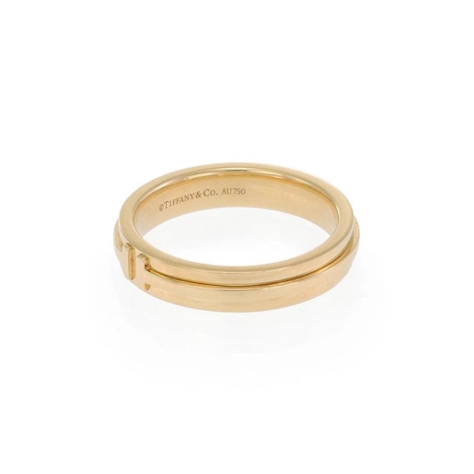 TIFFANY T WIDE BAND 18K YELLOW GOLD RING SIZE 8.5: TIFFANY T WIDE BAND 18K YELLOW GOLD RING SIZE 8.5 TIFFANY T WIDE BAND 18K YELLOW GOLD RING SIZE 8.5 Tiffany T 4.5mm Wide 18k Yellow Gold Band Ring Size 8.5 Description This elegant authentic ring is f