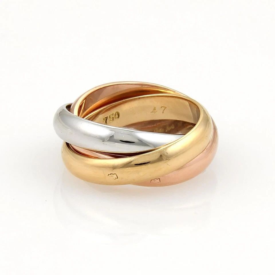 CARTIER TRINITY PARIS RING 18K TRI-COLOR GOLD 4MM ROLLING BAND EU 47-US 4: CARTIER TRINITY PARIS RING 18K TRI-COLOR GOLD 4MM ROLLING BAND EU 47-US 4 CARTIER TRINITY PARIS RING 18K TRI-COLOR GOLD 4MM ROLLING BAND EU 47-US 4 The Cartier Trinity rolling band ring is a lovely pi