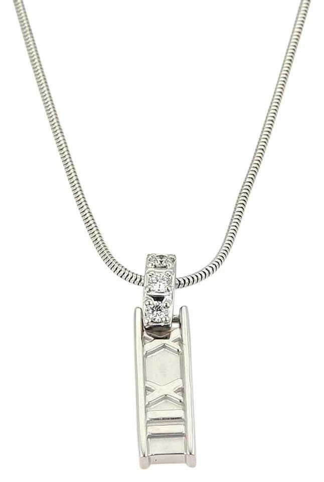 TIFFANY & CO. ATLAS PENDANT DIAMOND 18K WHITE GOLD SNAKE CHAIN NECKLACE: TIFFANY & CO. ATLAS PENDANT DIAMOND 18K WHITE GOLD SNAKE CHAIN NECKLACE TIFFANY & CO. ATLAS PENDANT DIAMOND 18K WHITE GOLD SNAKE CHAIN NECKLACE Tiffany & Co. White Gold Roman Atlas Diamond Numeral Pen