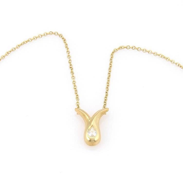 TIFFANY & CO. DIAMOND NECKLACE IN 18K YELLOW GOLD SOLITAIRE PEAR PENDANT: TIFFANY & CO. DIAMOND NECKLACE IN 18K YELLOW GOLD SOLITAIRE PEAR PENDANT TIFFANY & CO. DIAMOND NECKLACE IN 18K YELLOW GOLD SOLITAIRE PEAR PENDANT This Tiffany & Co. Diamond Necklace in 18k Yellow Gold