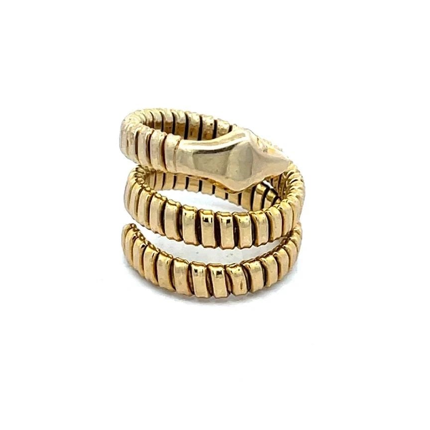 GOLD SNAKE RING 14K YELLOW TUBOGAS STYLE SERPENTINE WRAP BAND: GOLD SNAKE RING 14K YELLOW TUBOGAS STYLE SERPENTINE WRAP BAND This is an eye-catching wrap ring, it is a piece of fine jewelry, crafted with 14k yellow gold and a tubogas style design. The ring featur