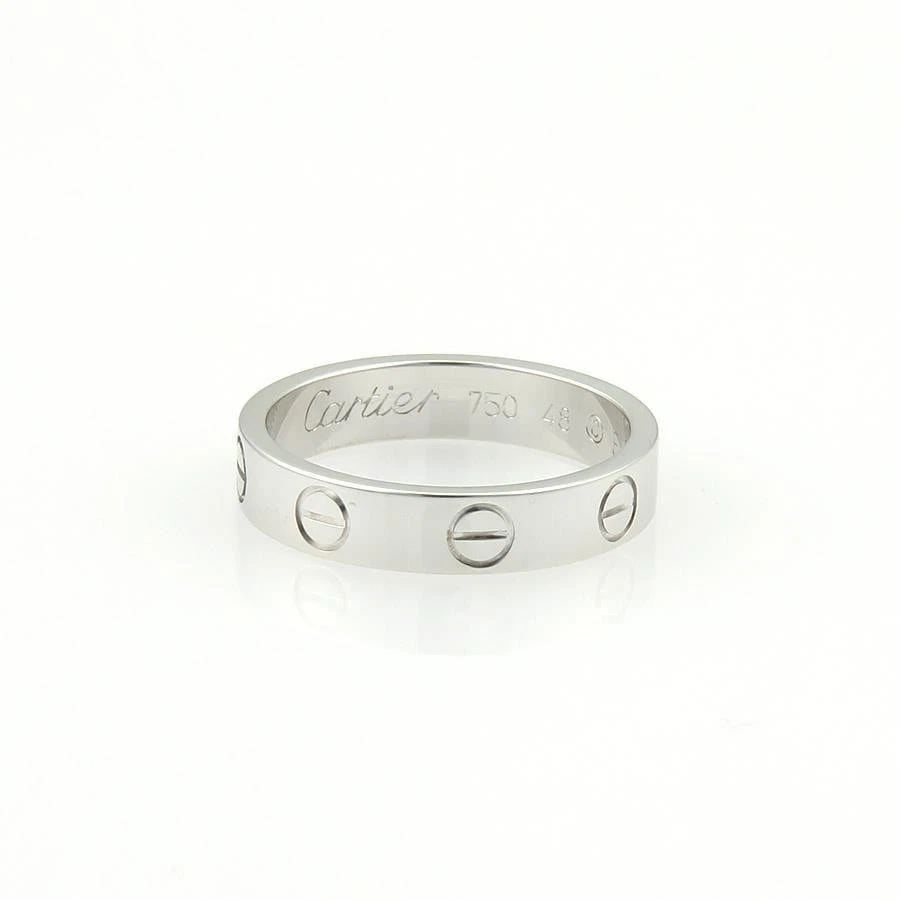 CARTIER MINI LOVE GOLD BAND 18K WHITE 3.5MM RING SIZE 4.5: CARTIER MINI LOVE GOLD BAND 18K WHITE 3.5MM RING SIZE 4.5 CARTIER MINI LOVE GOLD BAND 18K WHITE 3.5MM RING SIZE 4.5 The Cartier Mini Love Gold Band 18k White 3.5mm Ring in size 4.5 is a stunning piece