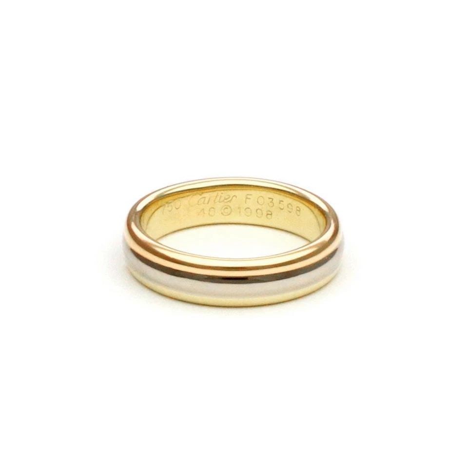 CARTIER RING 18K TRICOLOR GOLD 4MM WIDE SIZE 48-US 4.5: CARTIER RING 18K TRICOLOR GOLD 4MM WIDE SIZE 48-US 4.5 CARTIER RING 18K TRICOLOR GOLD 4MM WIDE SIZE 48-US 4.5 The Cartier Ring in 18k Tricolor Gold is a stunning piece of fine jewelry. With a band sty