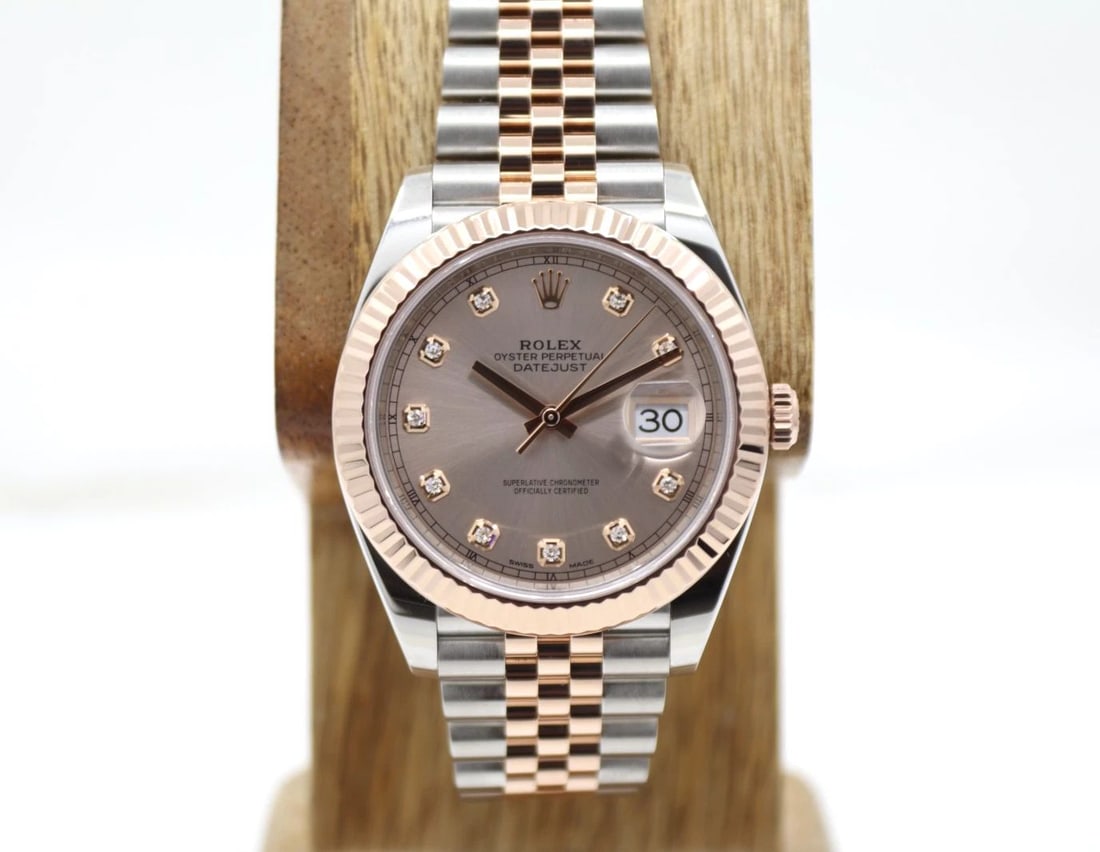ROLEX DATEJUST 18K TWO TONE 41MM SUNDUST DIAMOND DIAL WATCH 126331 W/ BOX: ROLEX DATEJUST 18K TWO TONE 41MM SUNDUST DIAMOND DIAL WATCH 126331 W/ BOX Description Rolex Datejust 18K Two Tone 41mm Sundust Diamond Dial Watch 126331 The watch has been used previously. The watch m