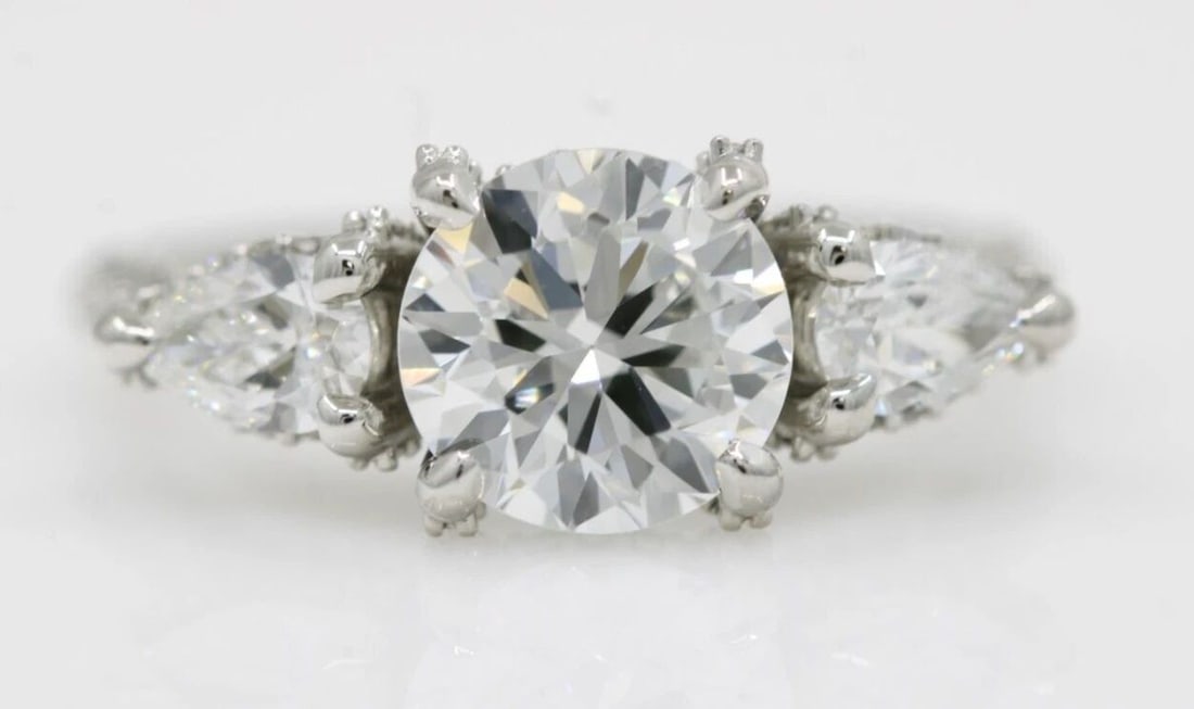 PLATINUM 3.25 TCW VS2 G NATURAL DIAMOND OLD EUROPEAN CENTER ENGAGEMENT RING: PLATINUM 3.25 TCW VS2 G NATURAL DIAMOND OLD EUROPEAN CENTER ENGAGEMENT RING Description Platinum 3.25 TCW Natural Diamond Old European Center Engagement Ring Ring is in great condition. May show signs