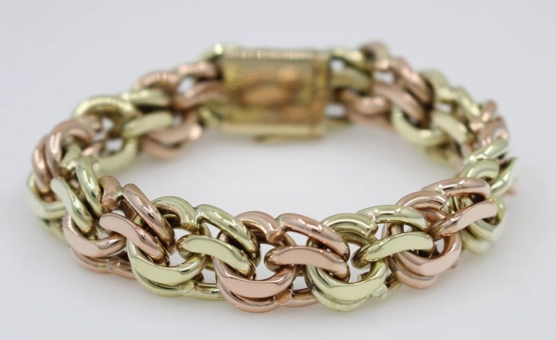 VINTAGE TIFFANY & CO 14K YELLOW & ROSE GOLD 13.5MM BISMARK LINK BRACELET 91G: VINTAGE TIFFANY & CO 14K YELLOW & ROSE GOLD 13.5MM BISMARK LINK BRACELET 91G Description Vintage Tiffany & Co 14K Yellow & Rose Gold 13.5mm Bismark Link Bracelet Bracelet is in good condition. May sho
