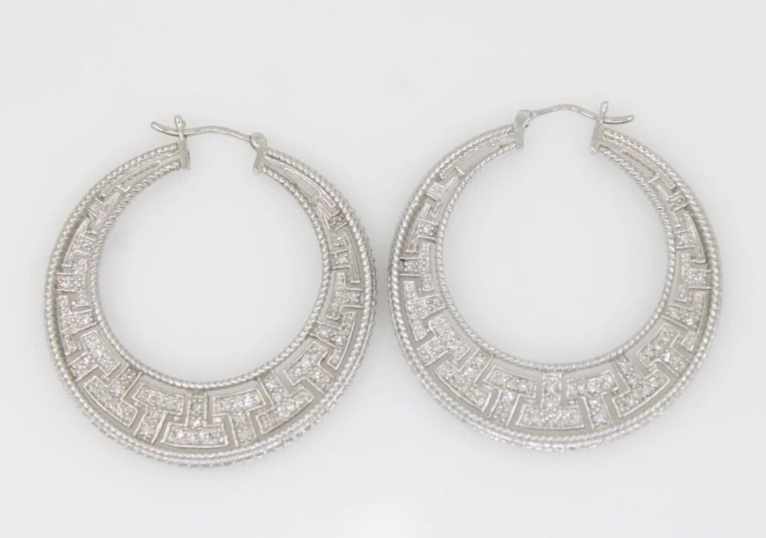 14K WHITE GOLD NATURAL DIAMOND HOOP EARRINGS 1.5" ~ 12.4 GRAMS: 14K WHITE GOLD NATURAL DIAMOND HOOP EARRINGS 1.5" ~ 12.4 GRAMS 14K WHITE GOLD NATURAL DIAMOND HOOP EARRINGS 1.5" ~ 12.4 GRAMS Description 14K White Gold Natural Diamond Hoop Earrings Earrings are in g