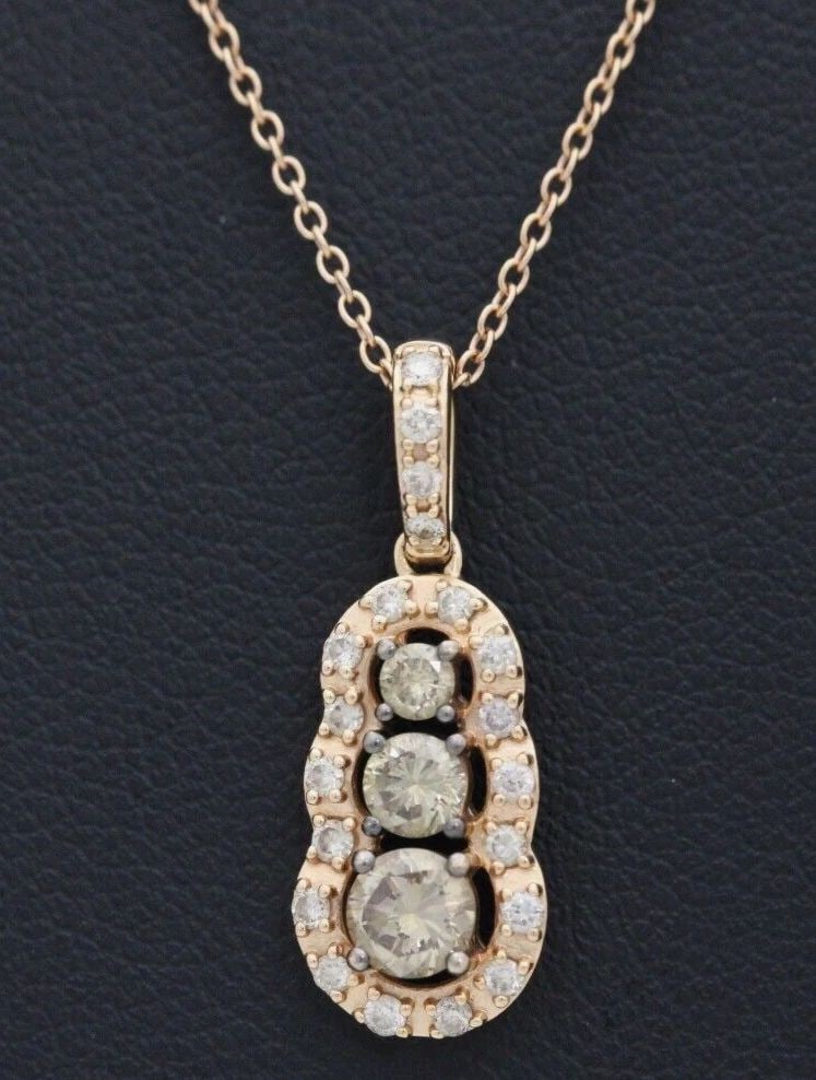 LEVIAN 14K ROSE GOLD NATURAL CHOCOLATE & WHITE DIAMOND PENDANT W/ 18" NECKLACE: LEVIAN 14K ROSE GOLD NATURAL CHOCOLATE & WHITE DIAMOND PENDANT W/ 18" NECKLACE LEVIAN 14K ROSE GOLD NATURAL CHOCOLATE & WHITE DIAMOND PENDANT W/ 18" NECKLACE Description LeVian 14K Rose Gold 0.60 TCW 