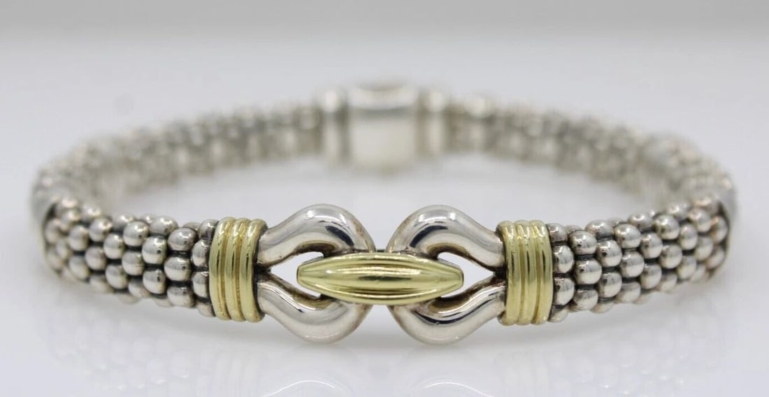 LAGOS STERLING SILVER & 18K GOLD 9MM CAVIAR DERBY BUCKLE BRACELET 8": LAGOS STERLING SILVER & 18K GOLD 9MM CAVIAR DERBY BUCKLE BRACELET 8" Description Lagos Sterling Silver & 18k Gold 9mm Caviar Derby Buckle Bracelet Item is in great condition. May show signs of wear an