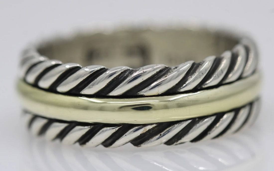 DAVID YURMAN STERLING SILVER & 14K YELLOW GOLD CABLE CLASSIC RING SIZE 10: DAVID YURMAN STERLING SILVER & 14K YELLOW GOLD CABLE CLASSIC RING SIZE 10 Description David Yurman Sterling Silver & 14K Yellow Gold Cable Classic Ring Ring is in good condition. May show signs of wea