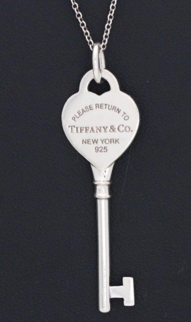 TIFFANY & CO STERLING SILVER PLEASE RETURN KEY PENDANT NECKLACE 20": TIFFANY & CO STERLING SILVER PLEASE RETURN KEY PENDANT NECKLACE 20" Description Tiffany & Co Sterling Silver Please Return Key Pendant Necklace Pendant/necklace is in good condition. May show signs of