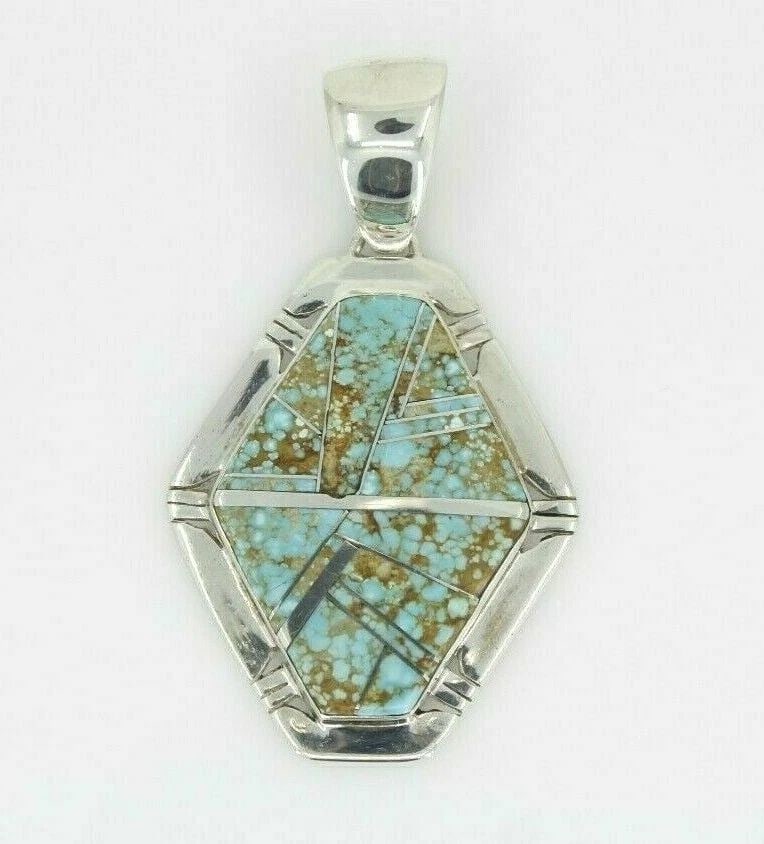LARGE FT NAVAJO INLAID KINGMAN TURQUOISE STERLING SILVER PENDANT ~ 24.1 GRAMS: LARGE FT NAVAJO INLAID KINGMAN TURQUOISE STERLING SILVER PENDANT ~ 24.1 GRAMS Description Large Navajo Kingman Turquoise Inlaid Sterling Silver Pendant Signed FT Item is in great condition. May show s