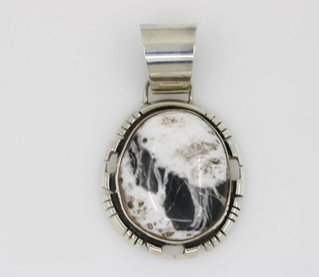 DANNY CLARK NAVAJO STERLING SILVER WHITE BUFFALO TURQUOISE PENDANT 14.5 GRAMS: DANNY CLARK NAVAJO STERLING SILVER WHITE BUFFALO TURQUOISE PENDANT 14.5 GRAMS Description Danny Clark Navajo Sterling Silver White Buffalo Turquoise Pendant Item is in great condition. May show signs 