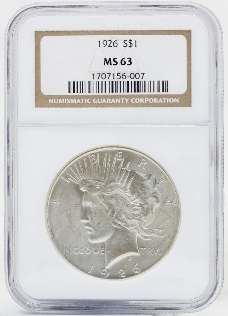 1926 PEACE SILVER DOLLAR MS-63 NGC OLDER HOLDER: 1926 PEACE SILVER DOLLAR MS-63 NGC OLDER HOLDER 1926 PEACE SILVER DOLLAR MS-63 NGC OLDER HOLDER Description 1926 Peace Silver Dollar MS-63 NGC Older Holder Coins has been graded as a MS-63 by NGC. The