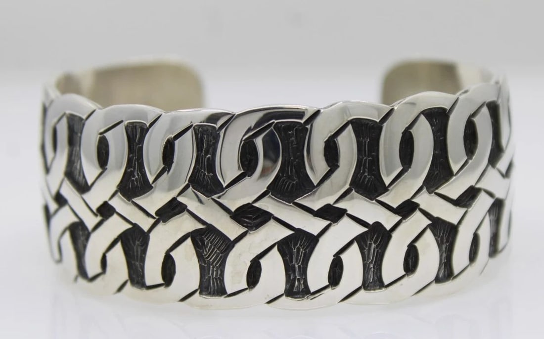 STERLING SILVER MEXICO CUFF BRACELET 6" - 53.9 GRAMS: STERLING SILVER MEXICO CUFF BRACELET 6" - 53.9 GRAMS Description Sterling Silver Mexico Cuff Bracelet Bracelet is in good condition. May show signs of wear and/or tear. Approximate Measurements Fits u