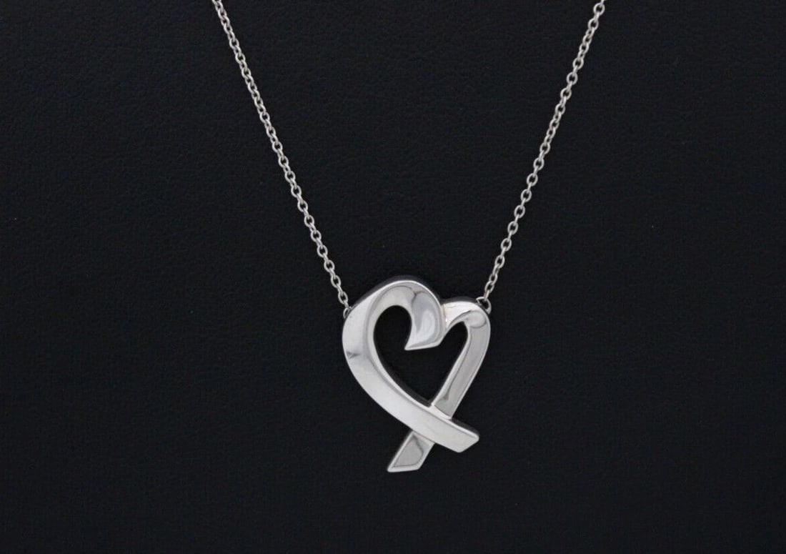TIFFANY & CO. PALOMA PICASSO STERLING SILVER LOVING HEART PENDANT 18" NECKLACE: TIFFANY & CO. PALOMA PICASSO STERLING SILVER LOVING HEART PENDANT 18" NECKLACE TIFFANY & CO. PALOMA PICASSO STERLING SILVER LOVING HEART PENDANT 18" NECKLACE Description Tiffany & Co. Paloma Picasso S