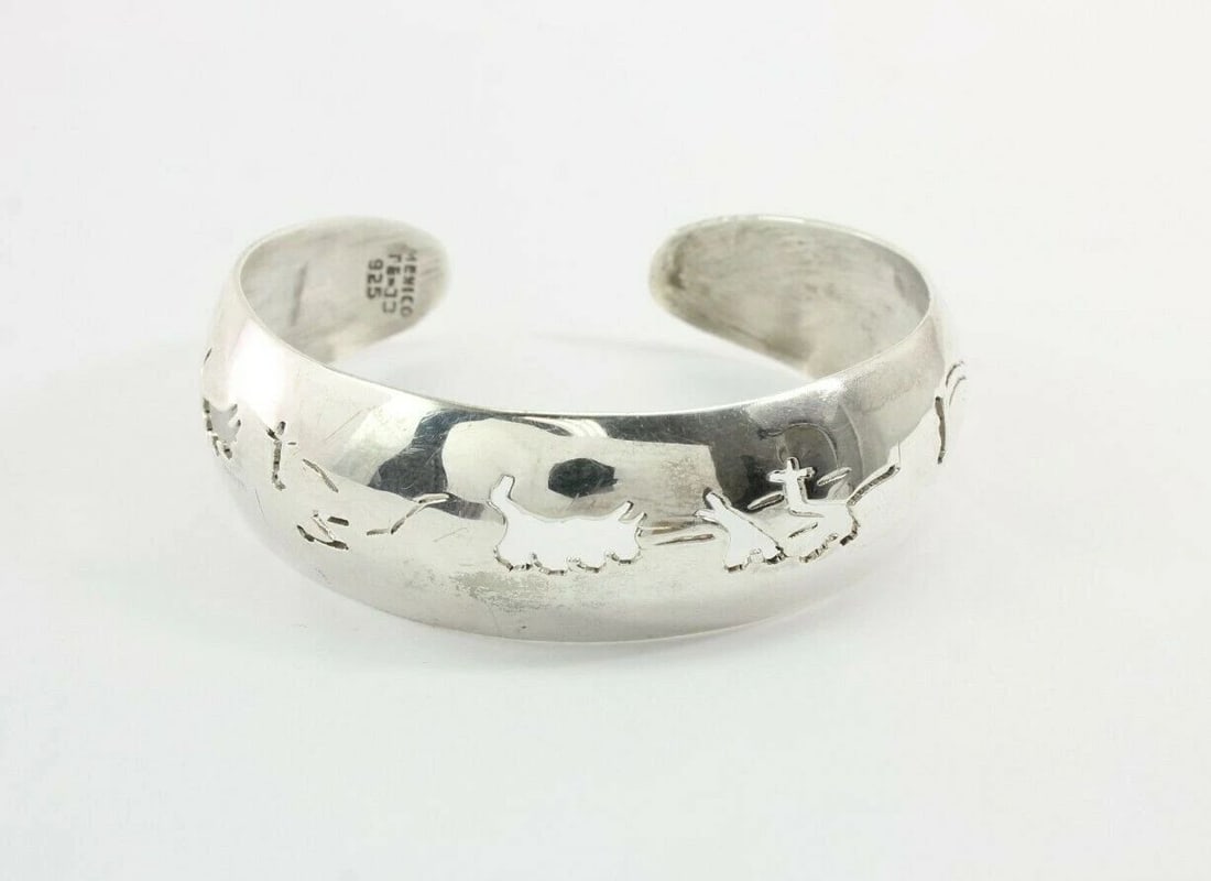 TAXCO MEXICO TE-33 STERLING SILVER PIERCED TRIBAL DESIGN CUFF SZ 6 1/2" - 20.3G: TAXCO MEXICO TE-33 STERLING SILVER PIERCED TRIBAL DESIGN CUFF SZ 6 1/2" - 20.3G TAXCO MEXICO TE-33 STERLING SILVER PIERCED TRIBAL DESIGN CUFF SZ 6 1/2" - 20.3G Description Taxco Mexico TE-33 Sterling 