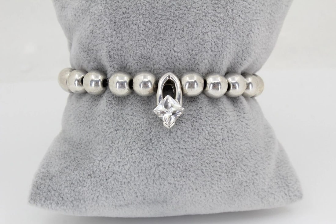 STERLING SILVER MEXICO 8MM BEAD LINK 7" BRACELET 10.6 GRAMS: STERLING SILVER MEXICO 8MM BEAD LINK 7" BRACELET 10.6 GRAMS STERLING SILVER MEXICO 8MM BEAD LINK 7" BRACELET 10.6 GRAMS Description Sterling Silver Mexico 8mm Bead Link 7" Bracelet Bracelet is in grea