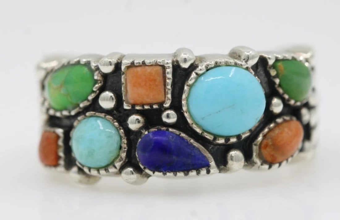 NK STERLING SILVER THAILAND MULTICOLOR GEMSTONE RING SIZE 9 - 8.4 GRAMS: NK STERLING SILVER THAILAND MULTICOLOR GEMSTONE RING SIZE 9 - 8.4 GRAMS Description NK Sterling Silver Thailand Multicolor Gemstone Ring Ring is in good condition. May show signs of wear and/or tear. 