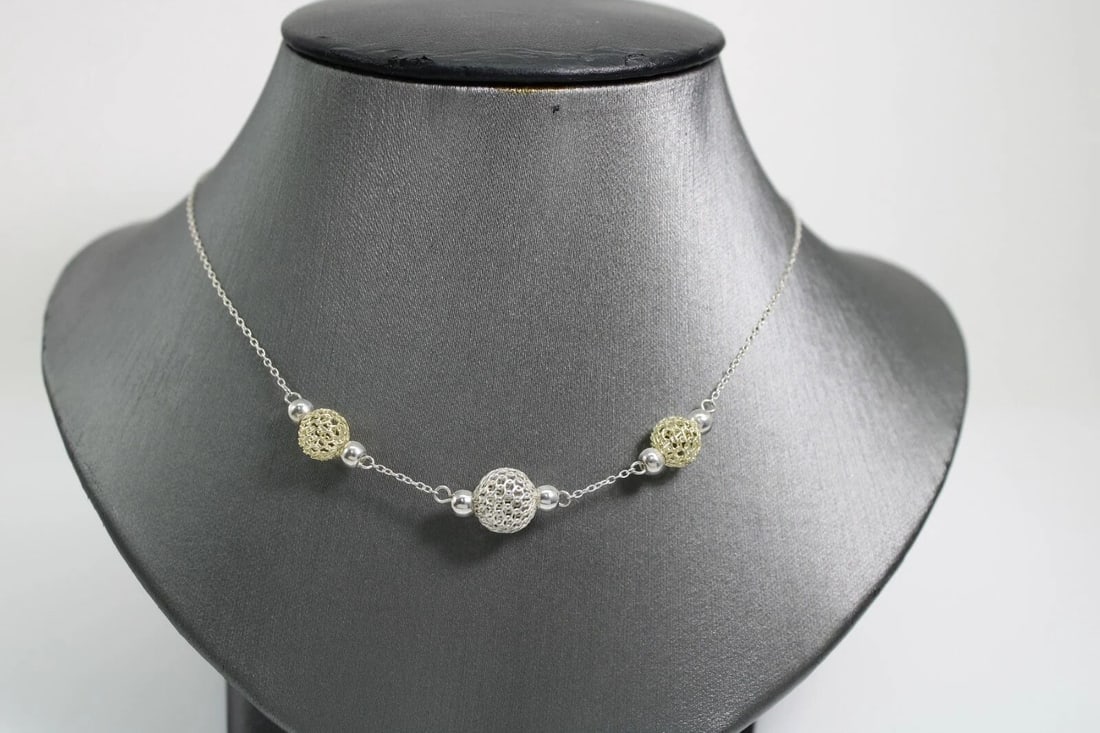 TWO TONE STERLING SILVER ITALY 3 OPEN BEAD 18 INCH NECKLACE: TWO TONE STERLING SILVER ITALY 3 OPEN BEAD 18 INCH NECKLACE Description Two Tone Sterling Silver Italy 3 Open Bead 18 inch Necklace Item is in great condition. May show signs of wear and/or tear. Item