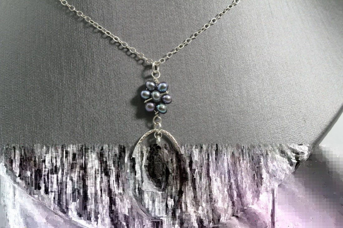 STERLING SILVER NECKLACE W/PURPLE DANGLING STONE & BLISTER PEARL FLOWER DESIGN: STERLING SILVER NECKLACE W/PURPLE DANGLING STONE & BLISTER PEARL FLOWER DESIGN Description Sterling Silver Necklace with Oval Shaped Pendant w/dangling Purple Tear Drop Shaped Stone and Blister Pearls
