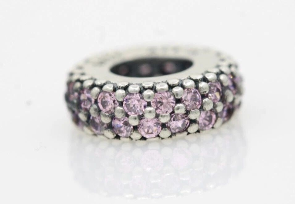 PANDORA STERLING SILVER PINK SPACER CHARM 791359PCZ 1.2 GRAMS: PANDORA STERLING SILVER PINK SPACER CHARM 791359PCZ 1.2 GRAMS Description Pandora Sterling Silver Pink Spacer Charm 791359PCZ 1.2 Grams "Two charms available. One charm per purchase price." Pandora ch