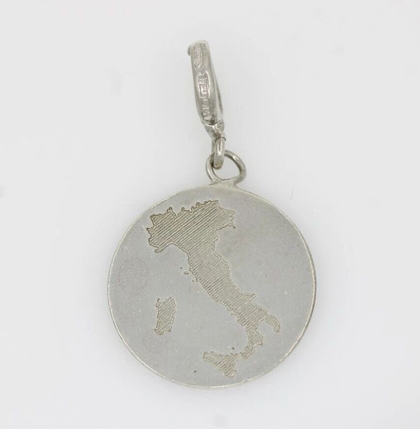 TEDORA STERLING SILVER 925 ITALY PENDANT 2.5 GRAMS: TEDORA STERLING SILVER 925 ITALY PENDANT 2.5 GRAMS Description Rare! Charriol Blanche Flamme Collection 18k White Gold Diamond Bangle Bracelet Item is in good condition. May show signs of wear and/or 
