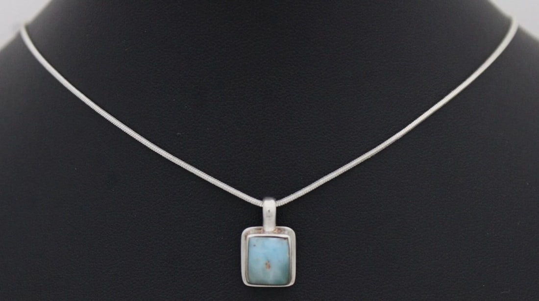 STERLING SILVER LARIMAR PENDANT NECKLACE 18" - 6.6 GRAMS: STERLING SILVER LARIMAR PENDANT NECKLACE 18" - 6.6 GRAMS Description Sterling Silver Larimar Pendant Necklace 18" Pendant/necklace is in good condition. May show signs of wear and/or tear. Approximate