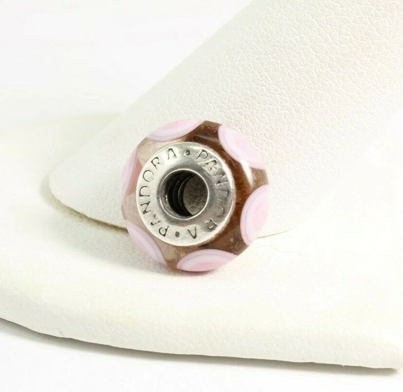 AUTHENTIC PANDORA STERLING SILVER PINK STEPPING STONES MURANO GLASS BEAD RETIRED: AUTHENTIC PANDORA STERLING SILVER PINK STEPPING STONES MURANO GLASS BEAD RETIRED Description Authentic Pandora Sterling Silver Pink Stepping Stones Murano Glass Bead Retired Item is in good condition.