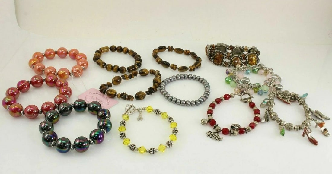 LOT OF 12 COSTUME JEWELRY BEADED BRACELETS BROWN, RED, ORANGE, SILVER, & GREEN (1 of 2)