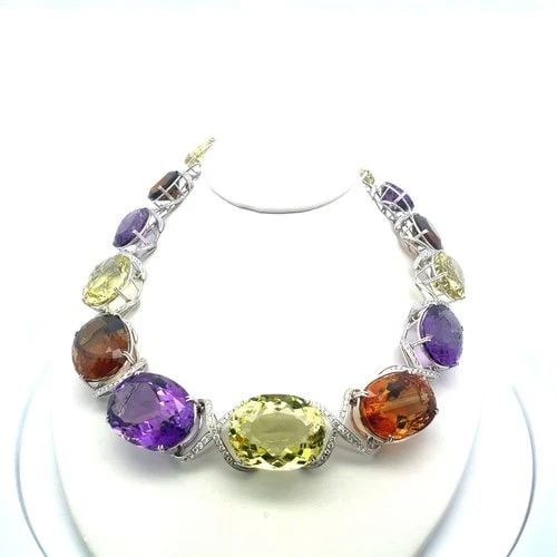 CITRINE AND AMETHYSTS 10.00 CARAT DIAMOND 18K WG GEMS STONE NECKLACE: CITRINE AND AMETHYSTS 10.00 CARAT DIAMOND 18K WG GEMS STONE NECKLACE Title: 333.30 Carat Oval Shape Citrine 166.66 Carat Oval Shape Amethysts 10.00 Carat Round Brilliant H VS1 Diamond 18 Karat White G