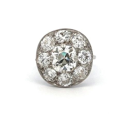 4.24 CARAT CUSHION & OLD EUROPEAN CUT DIAMOND PLATINUM ENGAGEMENT RING: 4.24 CARAT CUSHION & OLD EUROPEAN CUT DIAMOND PLATINUM ENGAGEMENT RING Title: This vintage platinum engagement ring showcases a breathtaking 2.24-carat Cushion Brilliant diamond, graded J VVS2 by GIA,
