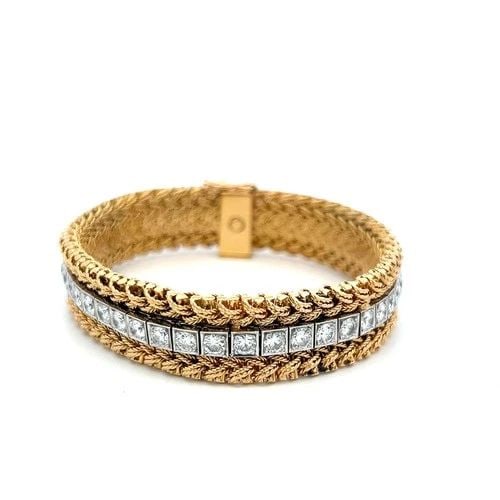 VINTAGE 18K TWO TONE GOLD WOVEN BRACELET WITH 6.6 CARAT CIRCULAR H VS DIAMONDS: VINTAGE 18K TWO TONE GOLD WOVEN BRACELET WITH 6.6 CARAT CIRCULAR H VS DIAMONDS Detailed Description: 18K Two Tone Gold, 6.6 Carat, H VS Clarity Embrace the timeless elegance of this vintage diamond br