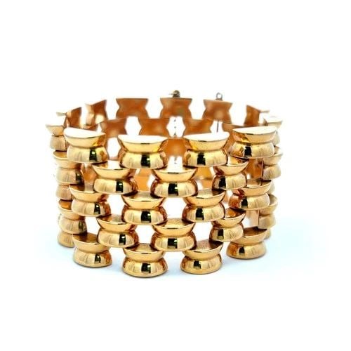 TIFFANY & CO VINTAGE PATTERNED LINK BRACELET IN 18 KARAT YELLOW GOLD 83.80 GRAMS: TIFFANY & CO VINTAGE PATTERNED LINK BRACELET IN 18 KARAT YELLOW GOLD 83.80 GRAMS Designer: Tiffany & Co Detailed Description: Elevate your elegance with this stunning vintage Tiffany & Co bracelet. Cr