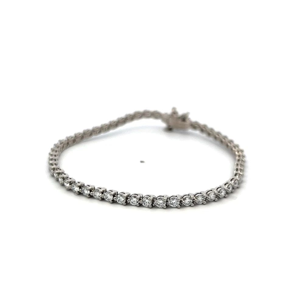 TIFFANY & CO VICTORIA TENNIS BRACELET 3.08CT F VS ROUND & MARQUISE DIAMONDS: TIFFANY & CO VICTORIA TENNIS BRACELET 3.08CT F VS ROUND & MARQUISE DIAMONDS Designer: Tiffany & Co Title: This exquisite Tiffany & Co. Victoria tennis bracelet showcases a total of 3.08 carats of exce