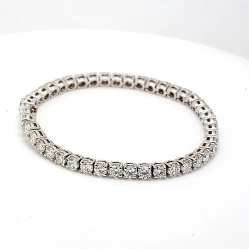 9.57CT G VS1 ROUND BRILLIANT DIAMOND PLATINUM TENNIS BRACELET – 7 INCH: 9.57CT G VS1 ROUND BRILLIANT DIAMOND PLATINUM TENNIS BRACELET – 7 INCH Title: This exquisite platinum tennis bracelet features 45 round brilliant diamonds totaling an impressive 9.57 carats, each gr
