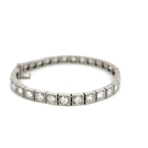 VINTAGE PLATINUM TENNIS BRACELET WITH 6.94 CARAT OLD EUROPEAN CUT H-VS DIAMONDS: VINTAGE PLATINUM TENNIS BRACELET WITH 6.94 CARAT OLD EUROPEAN CUT H-VS DIAMONDS Detailed Description: 6.94 Carat Old European Cut H VS Elevate your elegance with this vintage tennis bracelet, crafted 