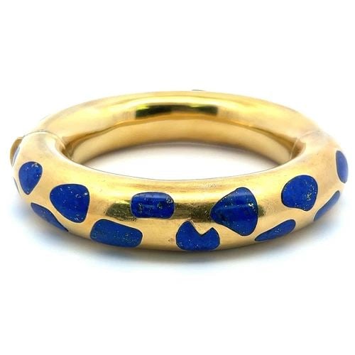 TIFFANY & CO. ANGELA CUMMINGS 18K YELLOW GOLD BANGLE BRACELET: TIFFANY & CO. ANGELA CUMMINGS 18K YELLOW GOLD BANGLE BRACELET Title: Tiffany & Co 18 Karat Yellow Gold Bangle Bracelet Style: Bangle Metal: 18 Karat Yellow Gold Dimension: 6.25"WIDE0.55IN Weight: 76.6