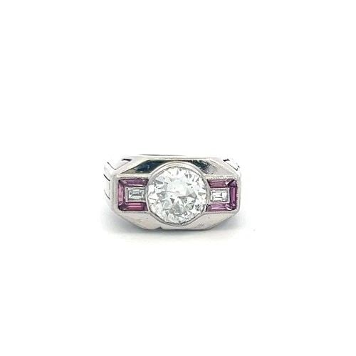 18K WG ART DECO RING WITH 2.13 CARAT GIA DIAMONDS & 0.18 CARAT RUBY SIZE 5: 18K WG ART DECO RING WITH 2.13 CARAT GIA DIAMONDS & 0.18 CARAT RUBY SIZE 5 Detailed Description: Embrace timeless elegance with this vintage Art Deco ring, crafted in 18K white gold. Showcasing a stun